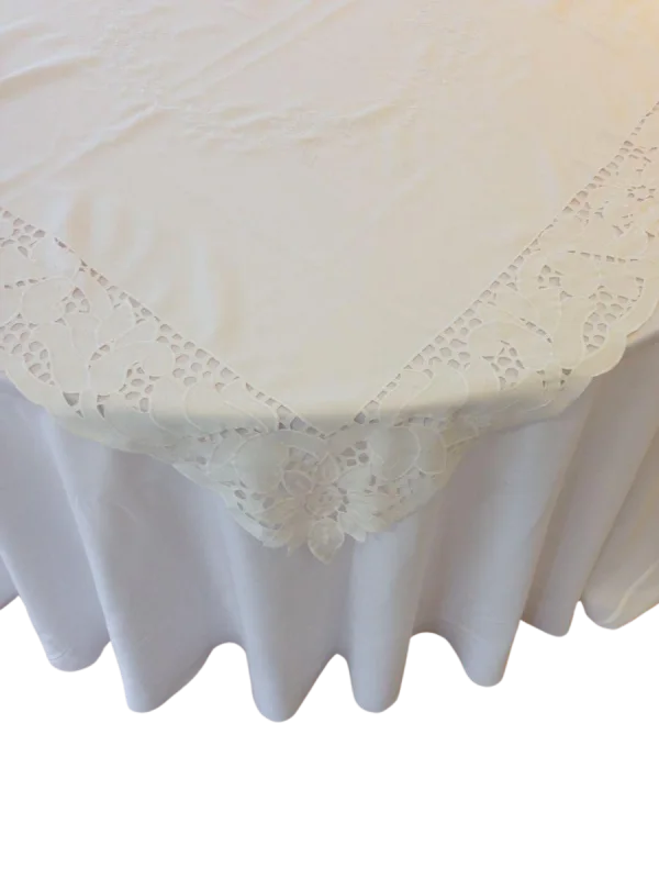 Embroidered ivory table overlay