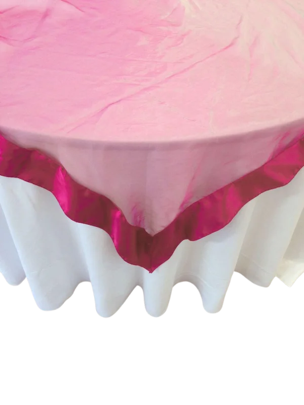Fuchsia pink organza table overlay with satin trim